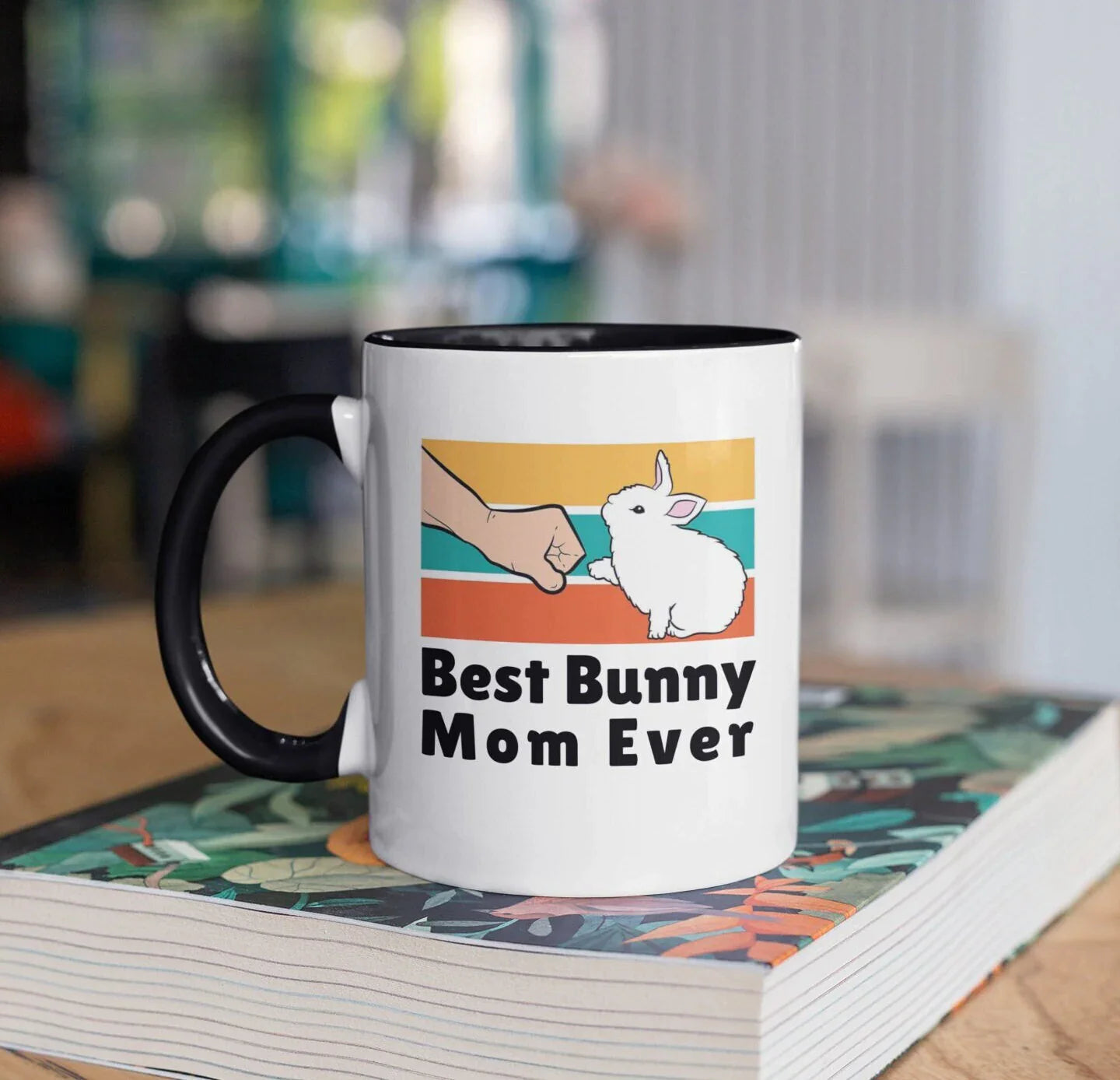 coffee mug with an image of a bunny fist bumping and the text "best bunny mom ever"